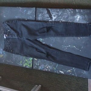 Black Sofia Vergara distressed jeans